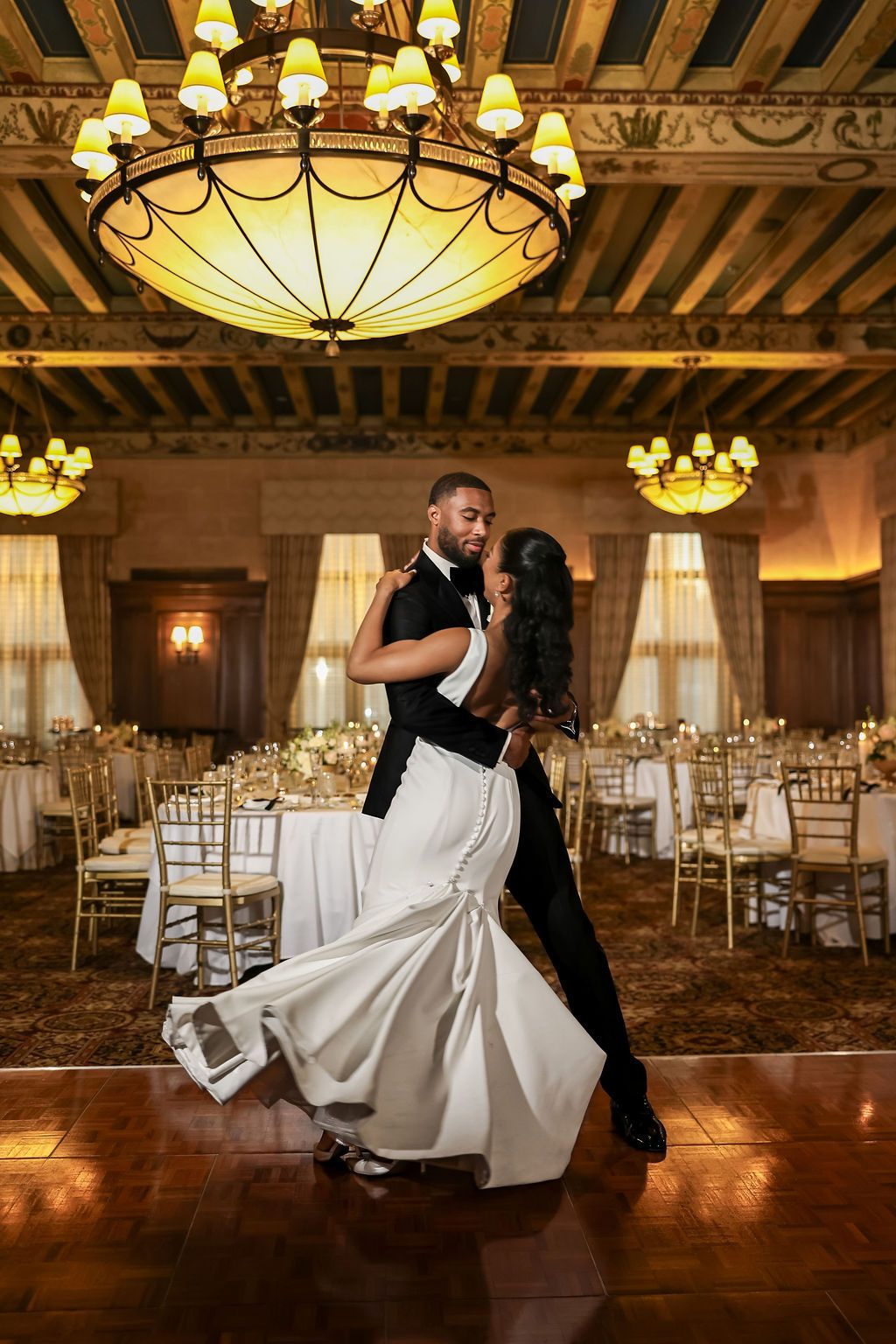 Bride bowling in her wedding gown at the Detroit Athletic Club